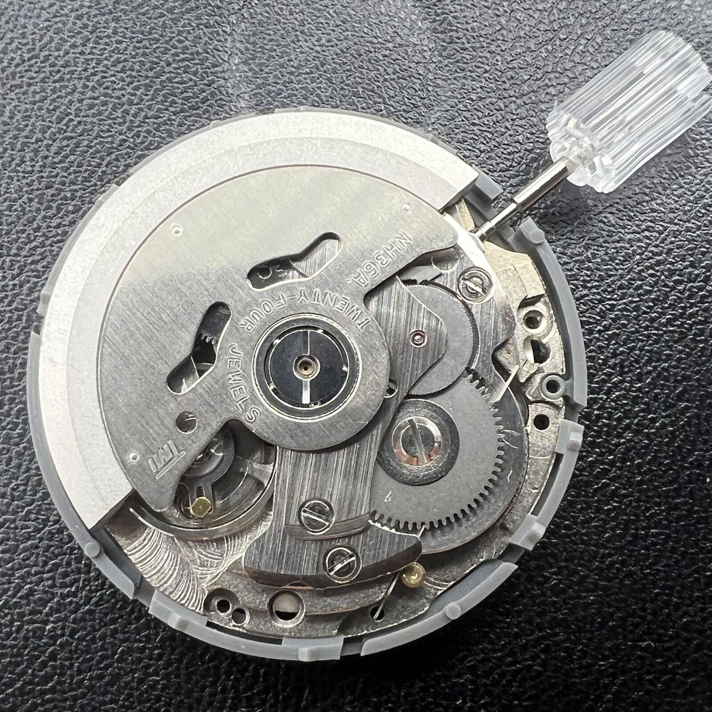 NH36A watch movement with white dial, blue lume, 3/3.8 crown positions by Seiko for precise timekeeping.