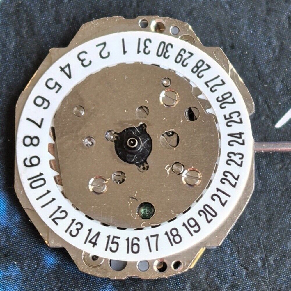 Miyota 4T13 quartz movement watch with single calendar date at 6 o'clock, precision Japan-made mechanism.