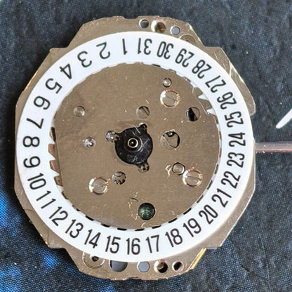 Miyota 4T13 quartz movement watch with single calendar date at 6 o'clock, precision Japan-made mechanism.