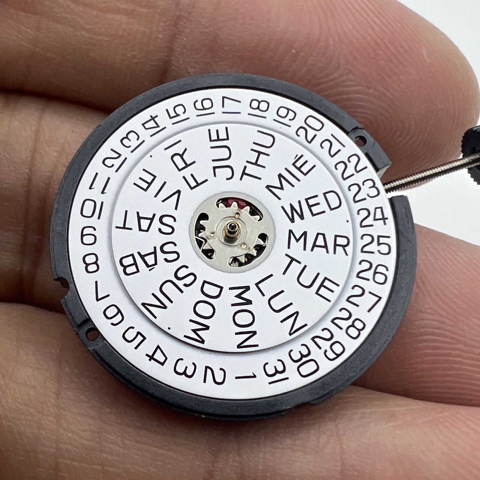 Swiss Made ETA 805.122 quartz watch with 3 hands, day/date display, and precision Swiss movement.