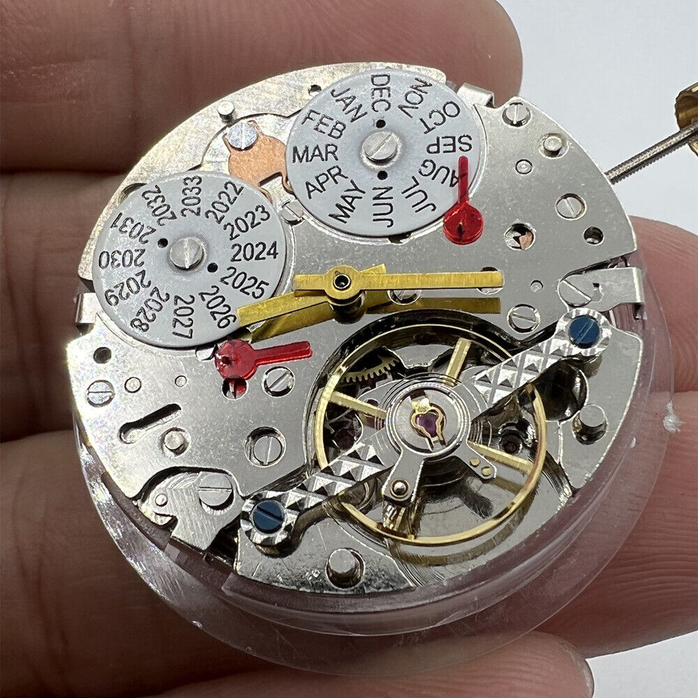 China Made Perpetual Calendar watch accessory showcasing mechanical movement with hollow balance wheel at 6 o'clock position.