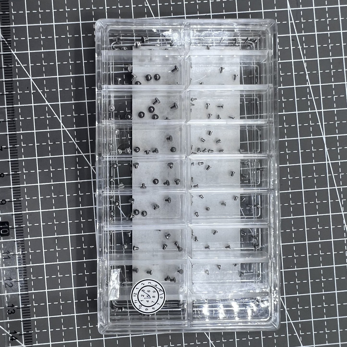 Set of 180 high-end stainless steel mini screws for watch case backs, straight line head.