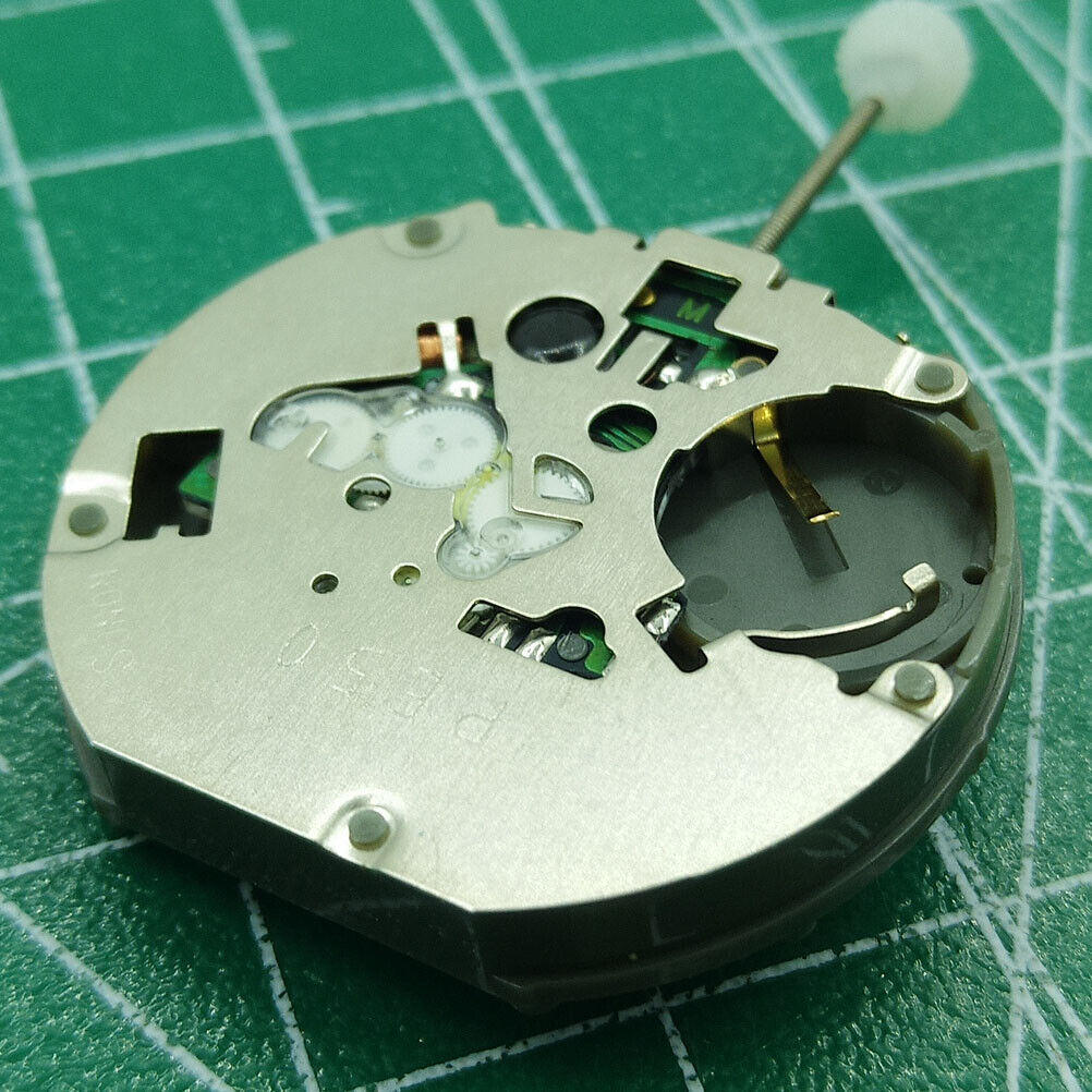 Sunon PE50 quartz watch movement with date at 3 and small seconds at 2, 6, 10 positions, precise timekeeping.