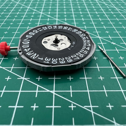 Miyota 2415 quartz watch movement with black date disk, Japan-made precision accessory for timepieces.