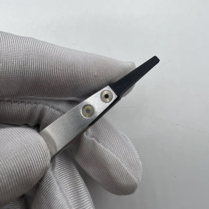 Horotec MSA12.711 carbon fibre tweezers with broad flat tips for precise watch accessory handling, Swiss Made.