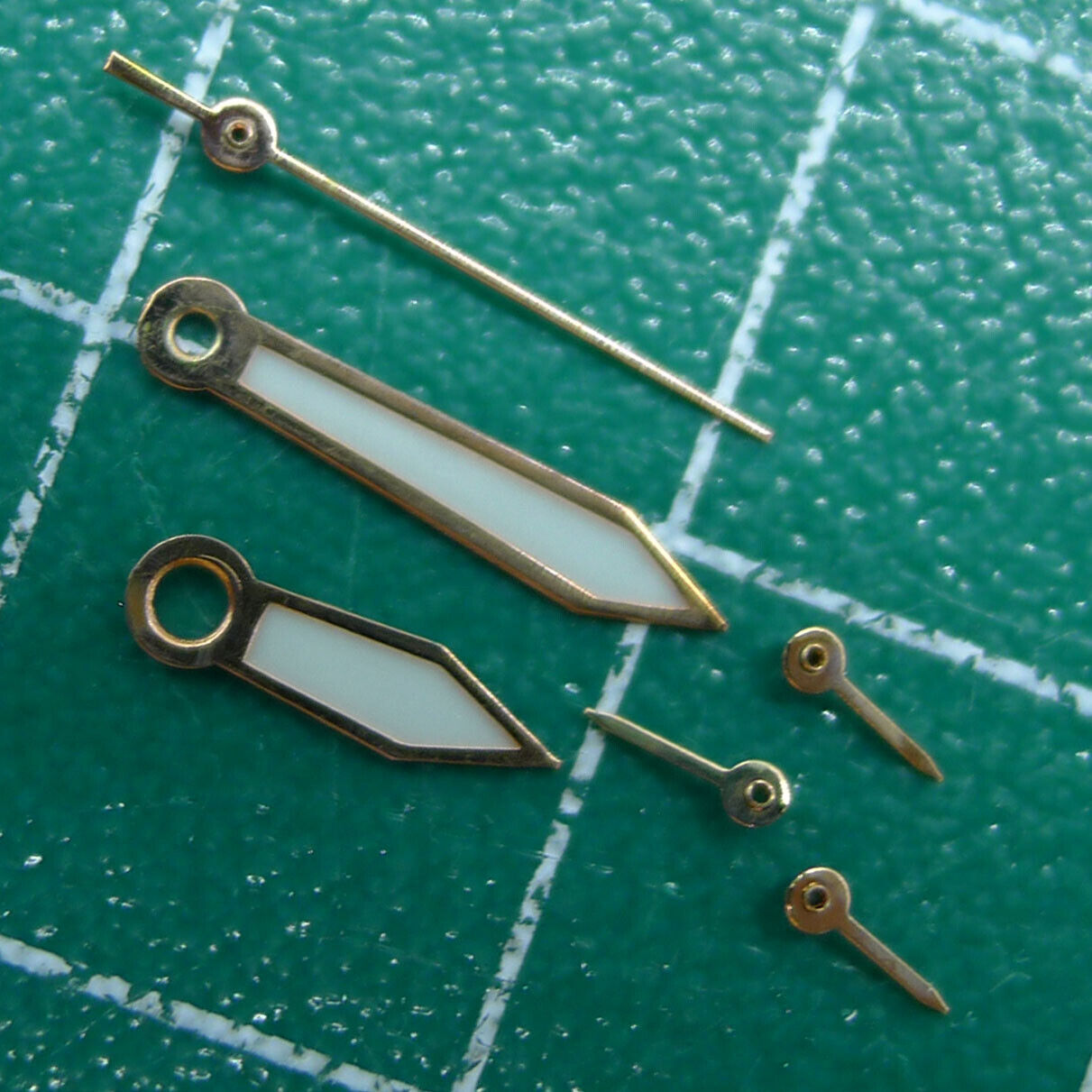 Set of 10mm luminous watch hands by Miyota, compatible with OS10/OS20/OS22/OS60/OS80 for low-light visibility.