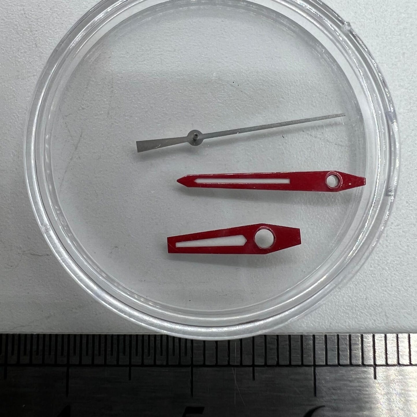 Red-trimmed watch hands with green luminous fill, compatible with Miyota 8215, 8205, DG2813 movements for precise timekeeping.