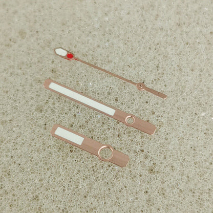 Green luminous watch hands with silver and rose gold trim, compatible with NH35/NH36 movements.