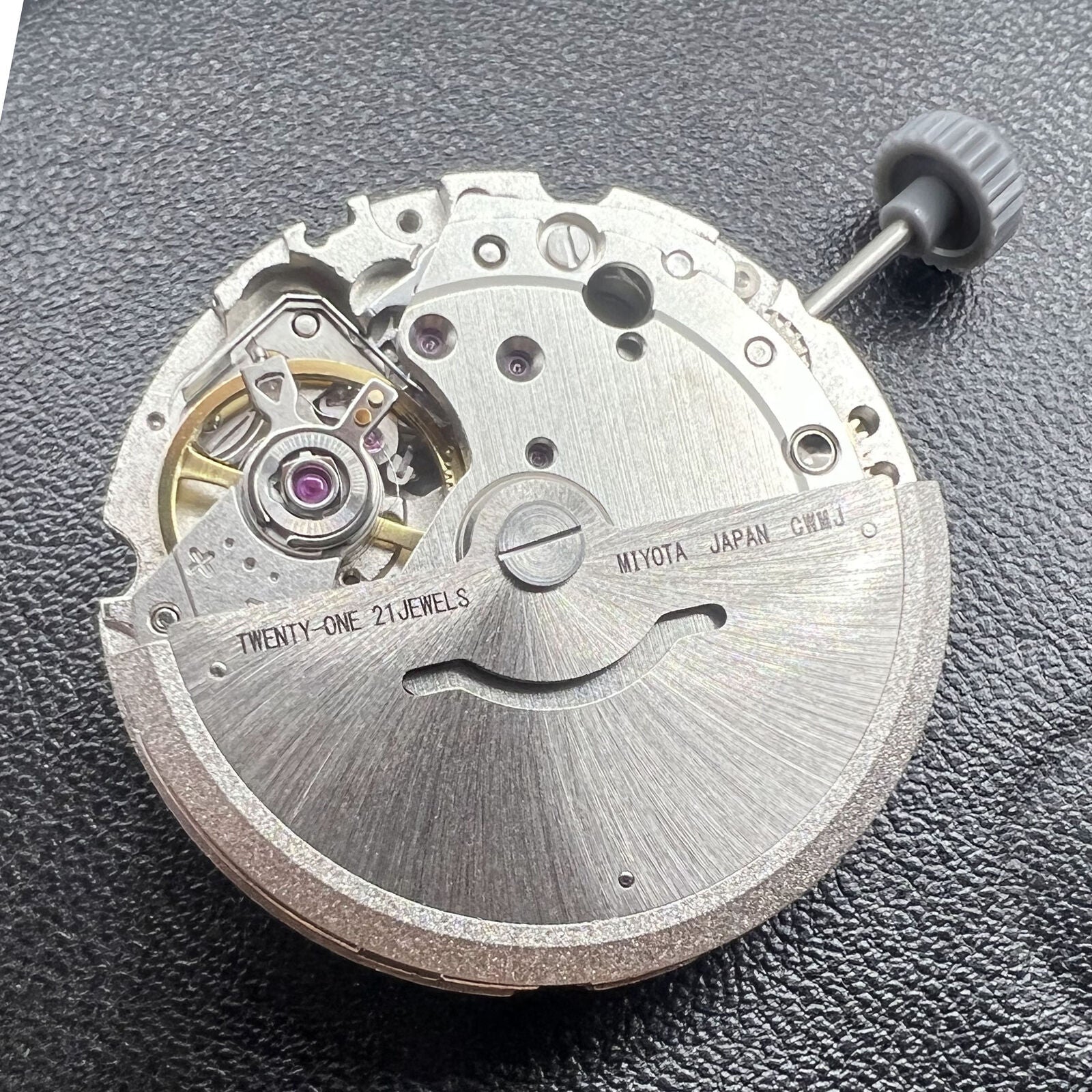 Miyota/Citizen 8200 automatic watch movement with double calendar, precise mechanical accessory for watches.