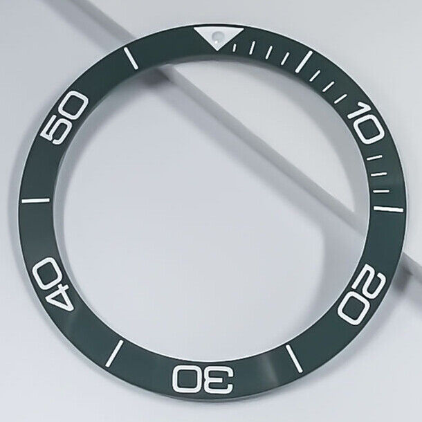 Ceramic blue luminous bezel ring by Conquest for 38.5mm watch, enhancing style and durability.