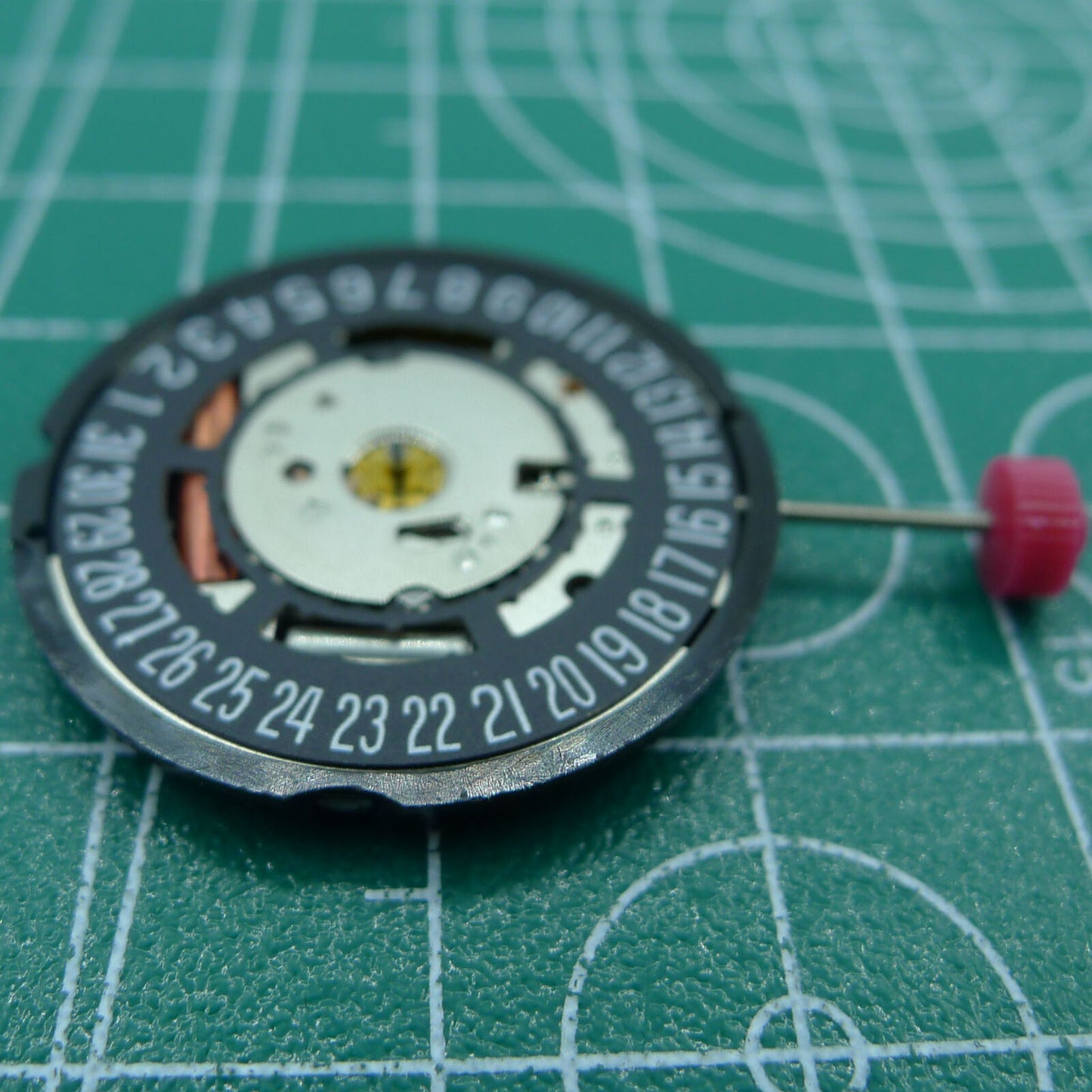 Swiss Part Ronda 715 quartz watch movement with black date wheel at 6 o'clock, ideal replacement part for watches.