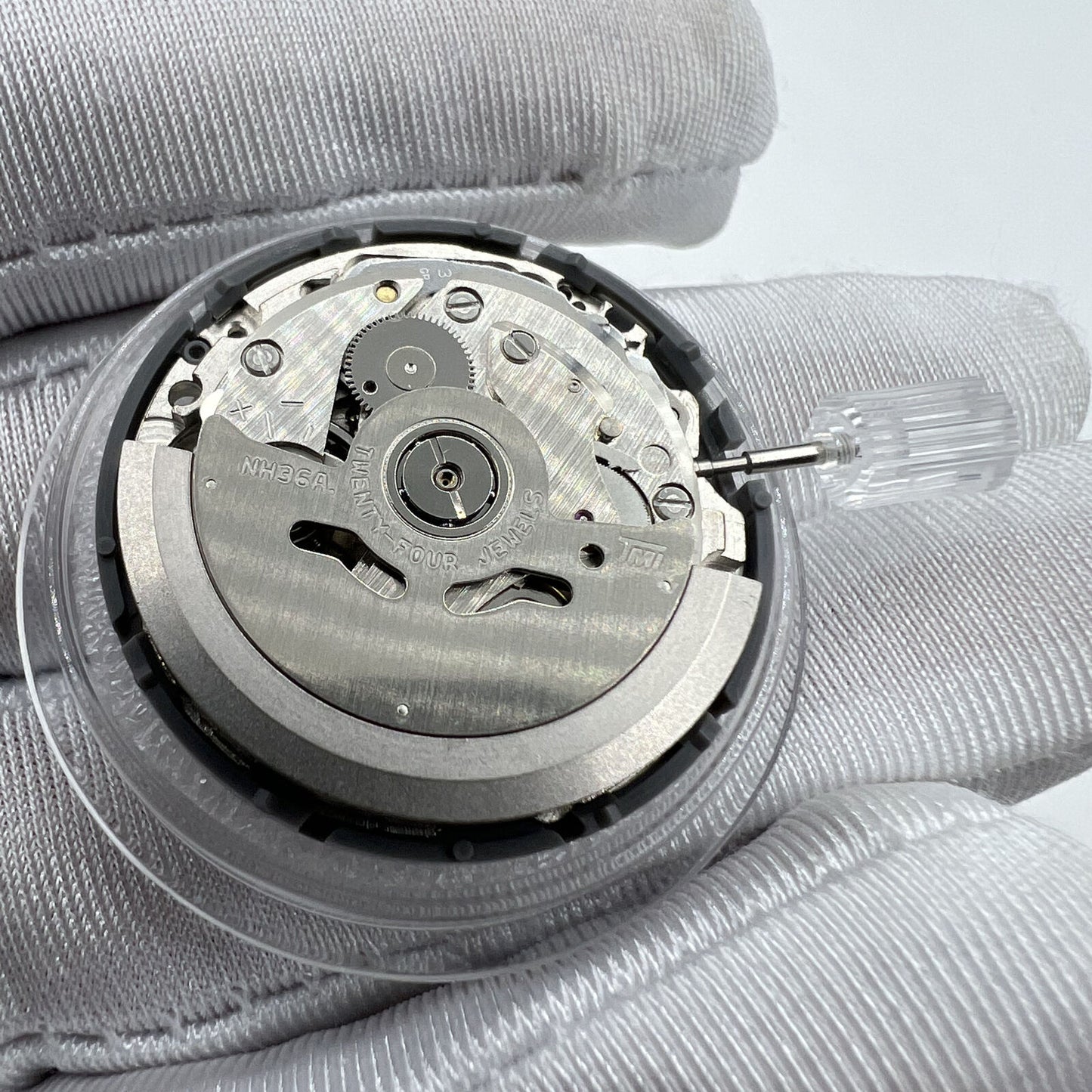 Japan Made NH36 automatic watch movement featuring Arabic date dial and 3 o'clock crown.