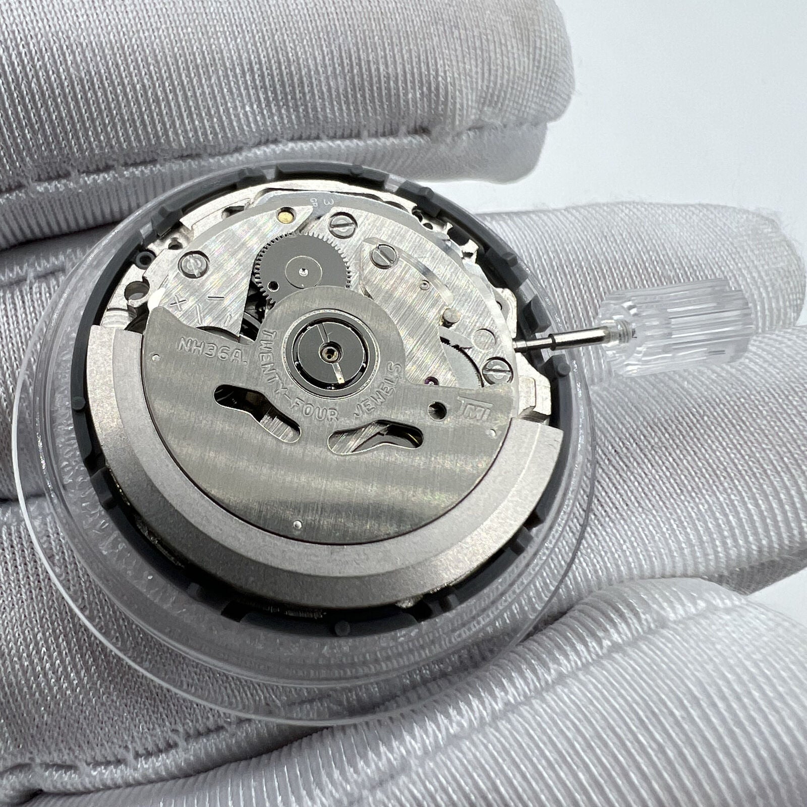 Japan Made NH36 automatic watch movement featuring Arabic date dial and 3 o'clock crown.