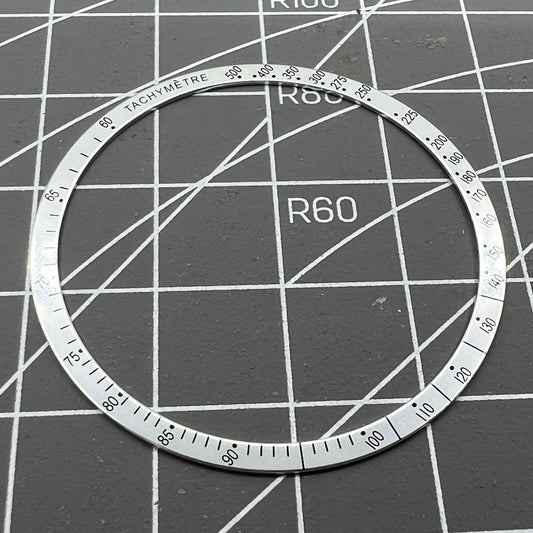 38.5mm Omega Speedmaster aluminum alloy white ring bezel with black font detail for watch customization.