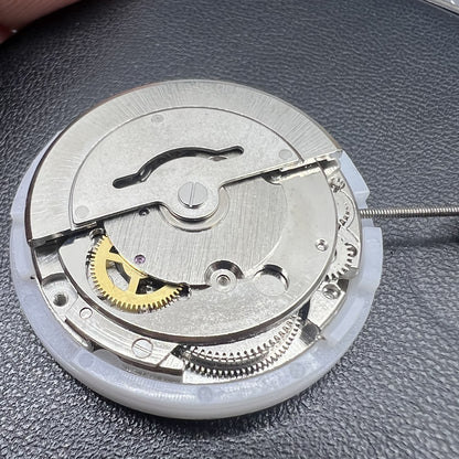 MINGZHU 2813 8205 silver automatic watch movement displaying date and day functions with precision