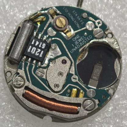 Swiss Made ETA556.115 quartz movement with 2 hands and date display at 3 o?clock for watch repair.