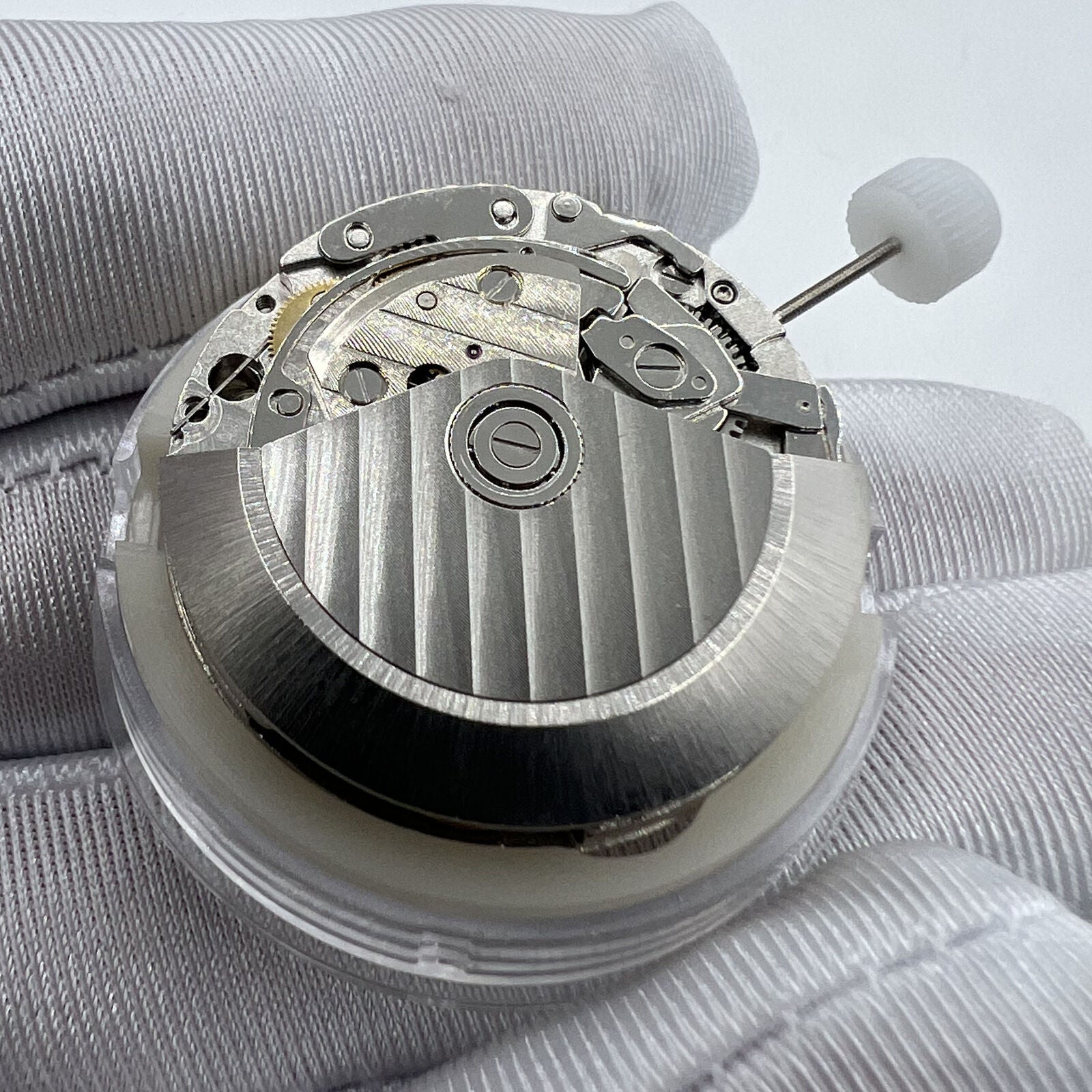 Close-up of China Made 7753 mechanical movement clone for Daytona watch repairs and customization.