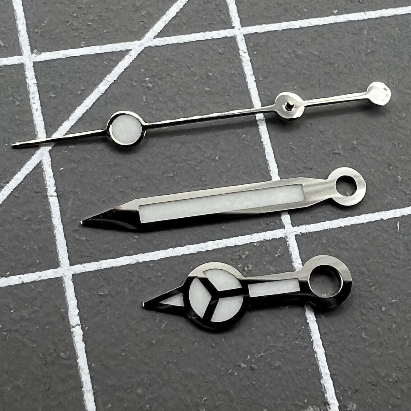 Luminous watch hands set for RLX 3135 movement with hour, minute, and second hands by Luminous.