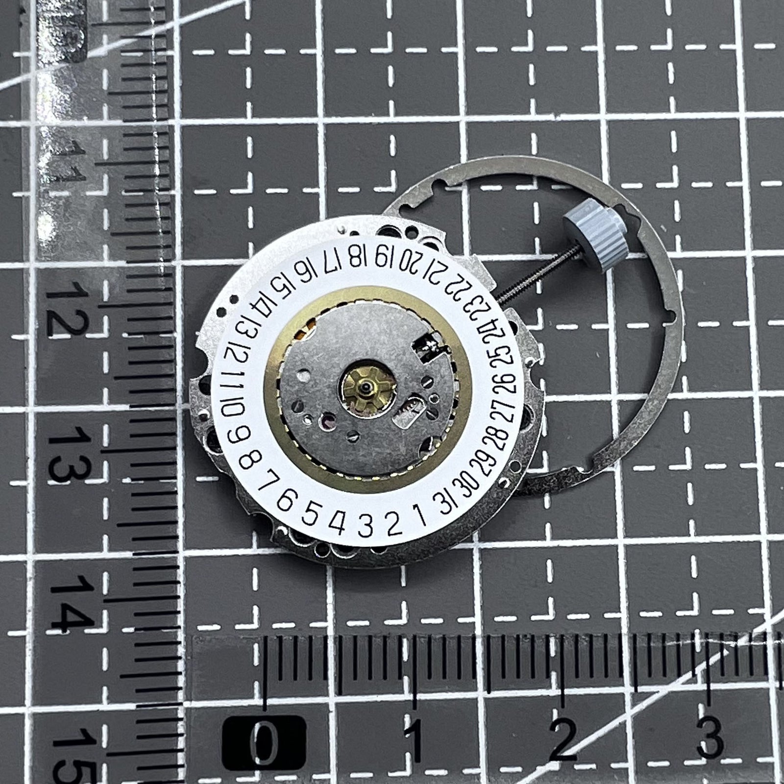 Swiss Ronda 705 quartz watch with date display at 6 o'clock, elegant design for everyday wear.
