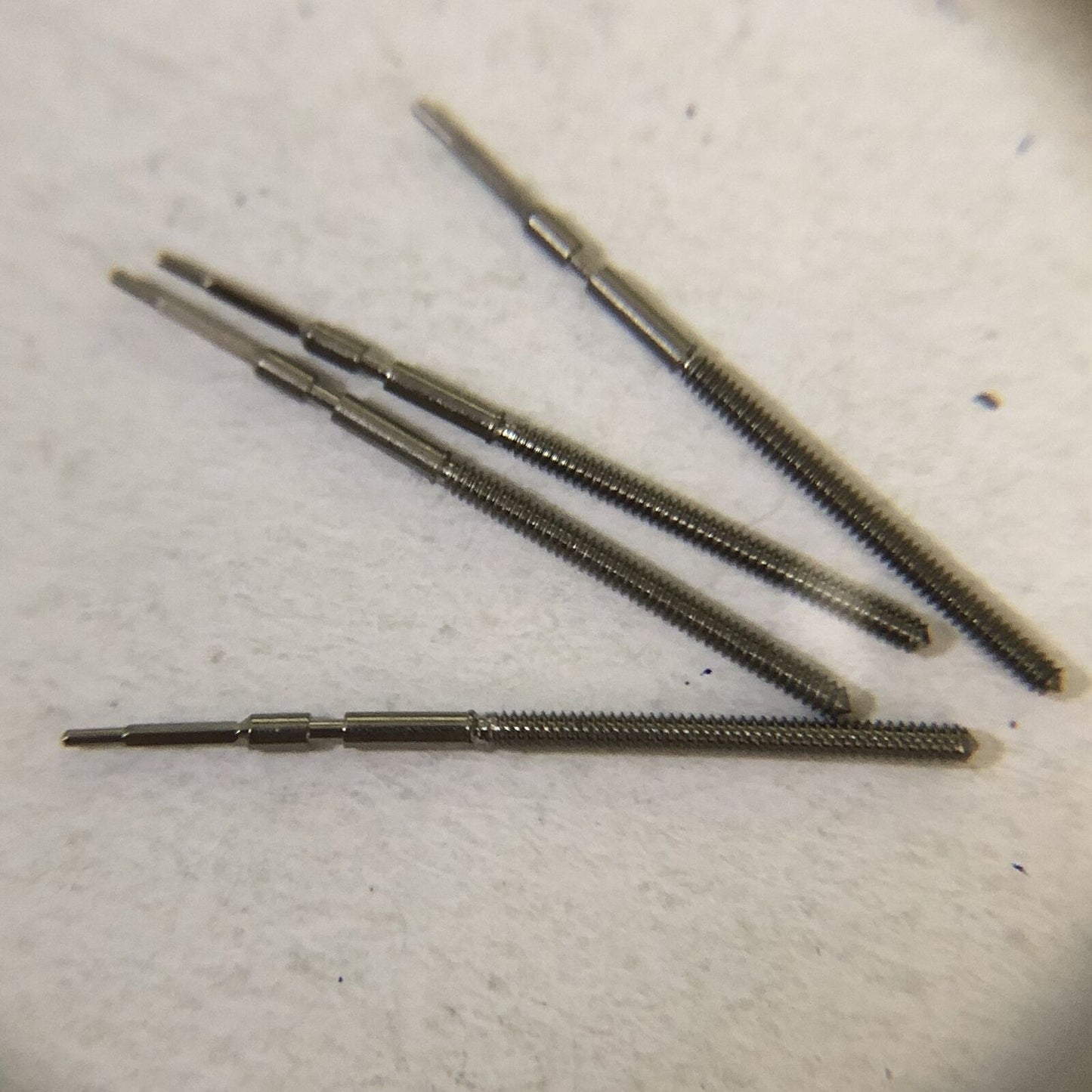 Generic watch winding stems for Ronda 1002, 1012, 1017, 1004 movements, compatible watch accessory.