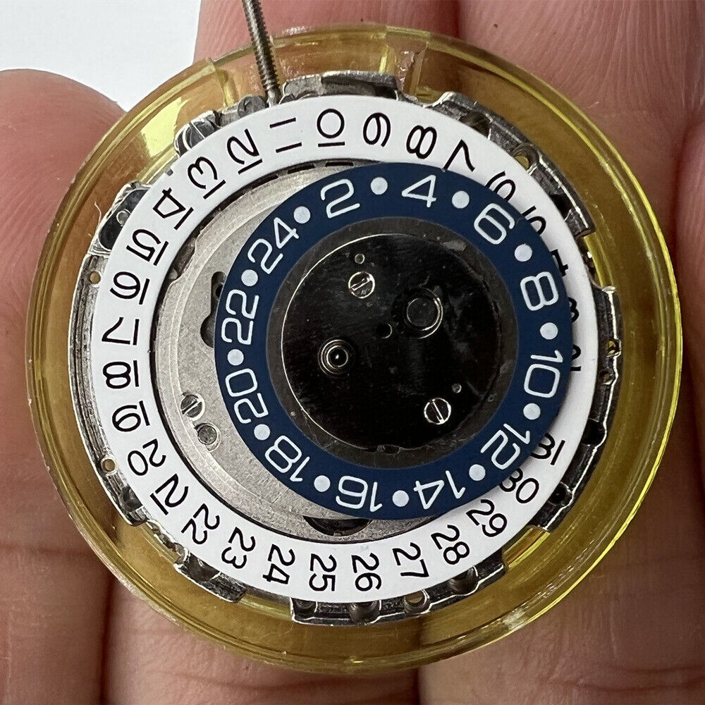 DG2813 automatic watch movement with 3 hands and 24-hour silver display window for precision timekeeping.