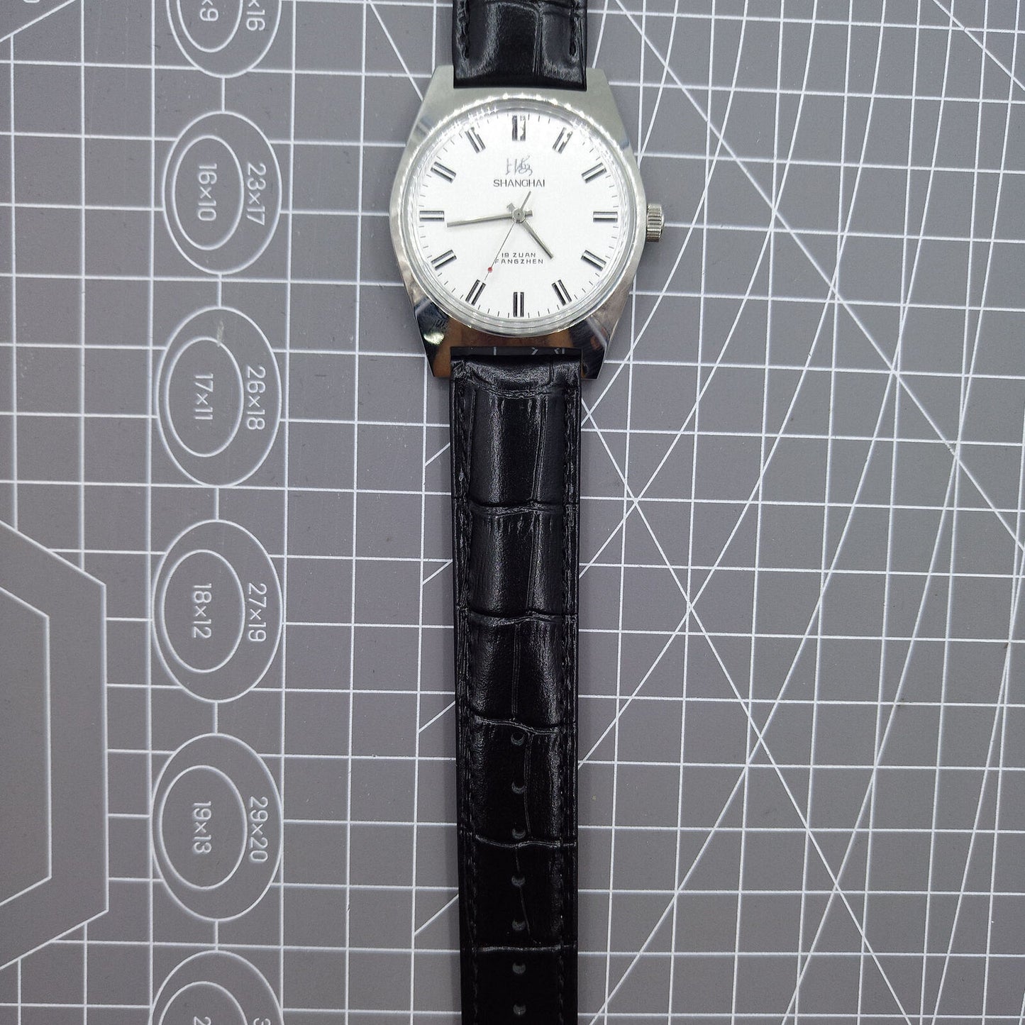 Shanghai Factory 38mm manual mechanical watch with white dial, 3 hands, 19 jewels, classic style.