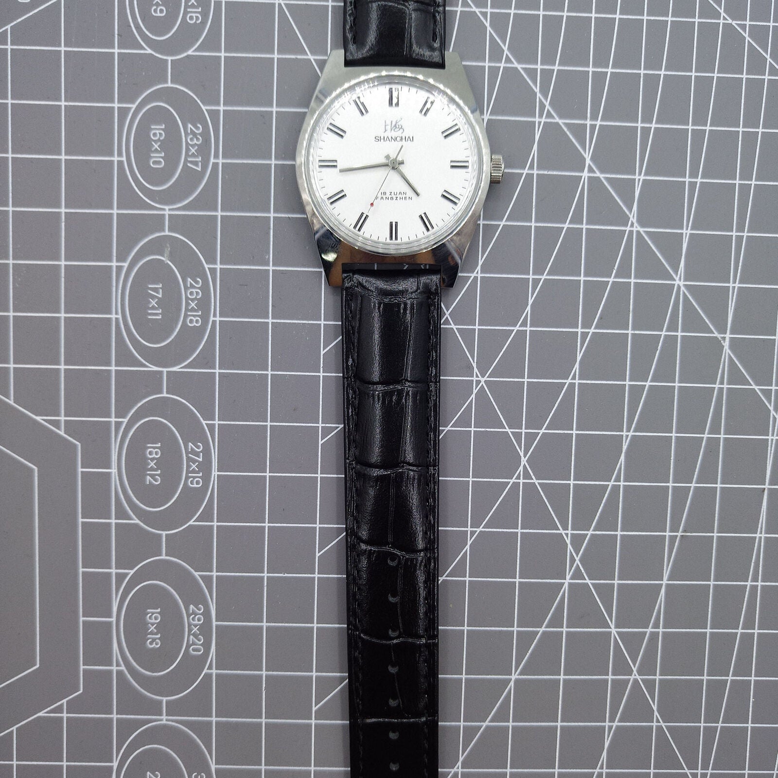 Shanghai Factory 38mm manual mechanical watch with white dial, 3 hands, 19 jewels, classic style.