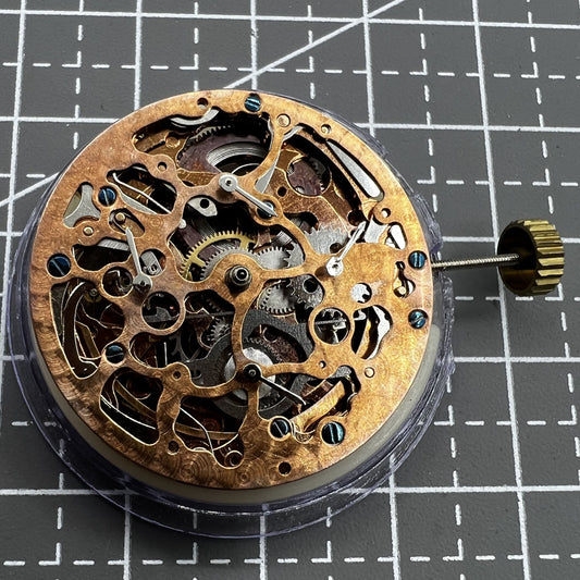 Hollow Rose gold watch with mechanical movement, 4 eye subdials, and 7 hands