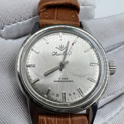 Classic 32mm Chunlan manual mechanical watch with silver dial and light brown leather strap, 17 jewels.