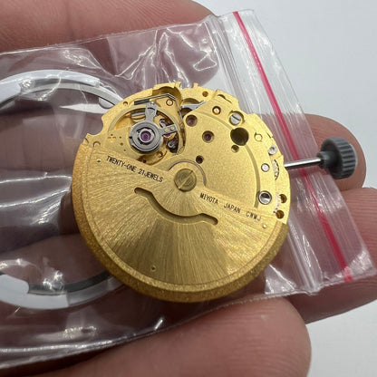 Genuine Golden Miyota Citizen 8200 8215 automatic watch movement for precise accessory repairs.