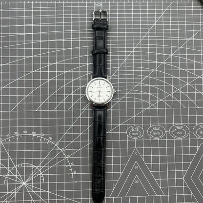 37mm Baihua manual mechanical watch with silver dial, 19 jewels, shock-resistant design for durability.