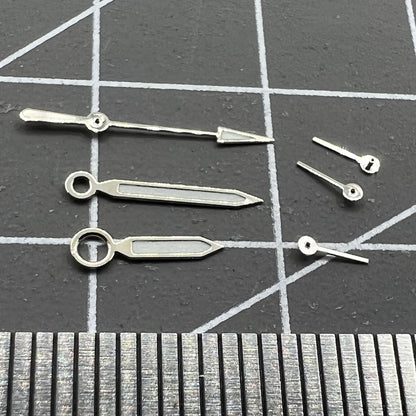 Aiguilles de montre à lumens verts avec garniture argentée pour mouvement à quartz argenté ISA 8162 et ISA 8172