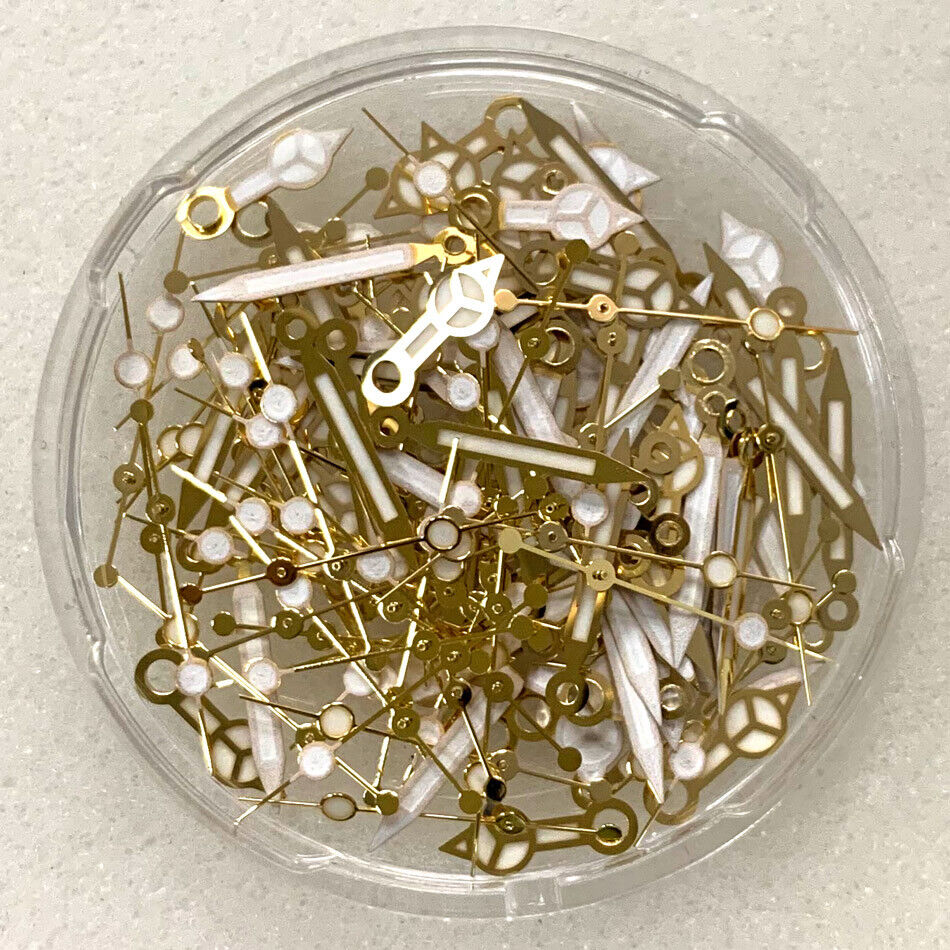 Golden trim blue luminous watch hands set designed for NH35 NH36 movement, enhancing visibility and style.