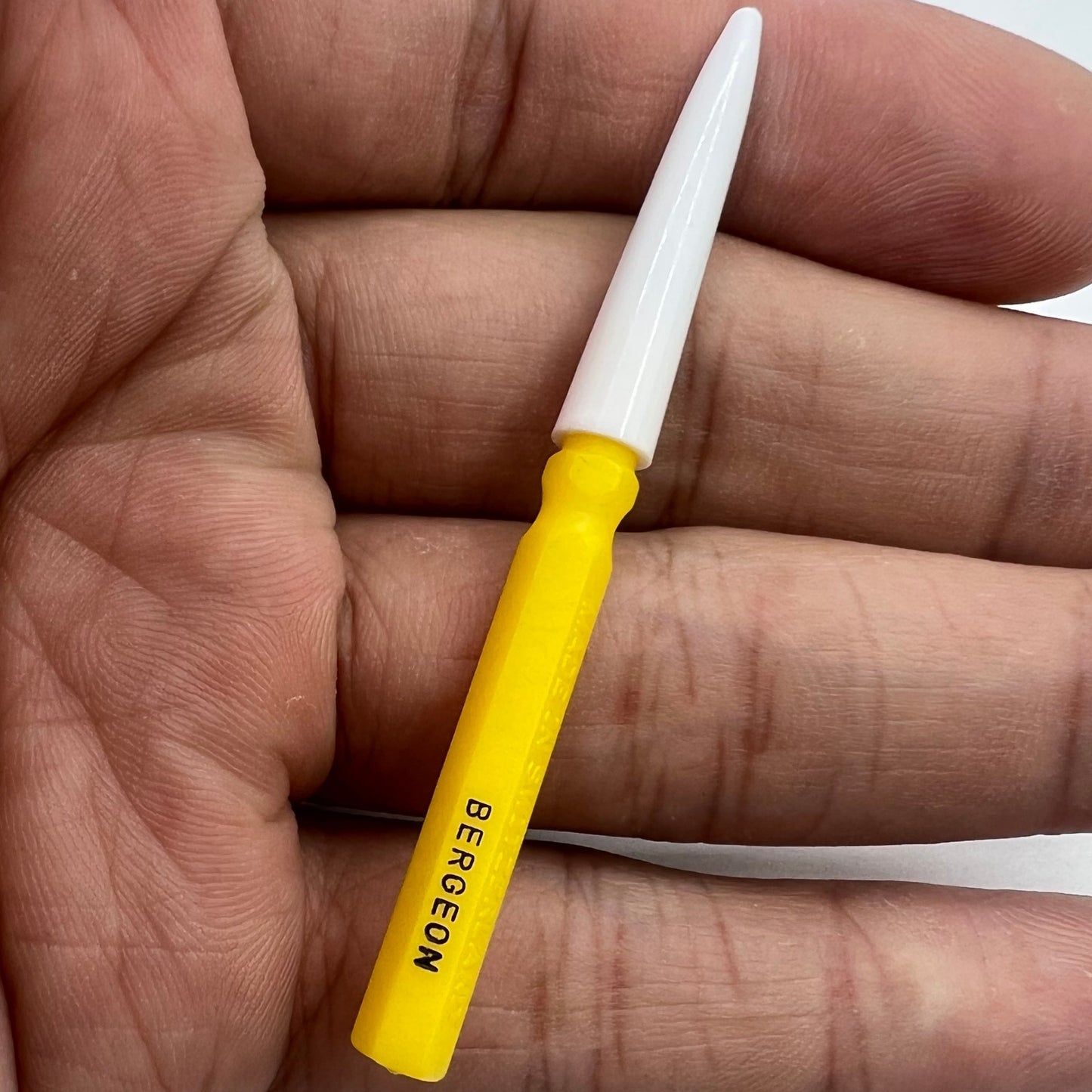 Bergeon 30102-D very large yellow watch dip oiler, precision Swiss tool for watch repair and maintenance.