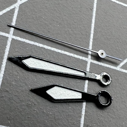 Two sets of 12mm black-trimmed white watch hands for Ronda 515 quartz watches.