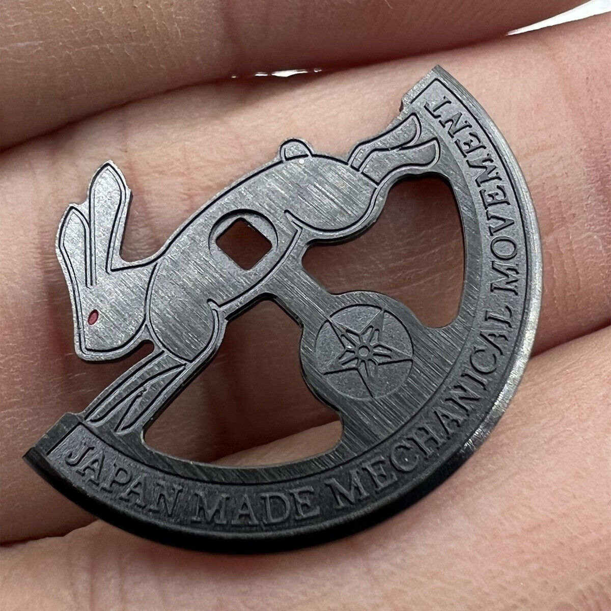 Black hollow rabbit-shaped rotor oscillating weight for Miyota 8215 watch movement.