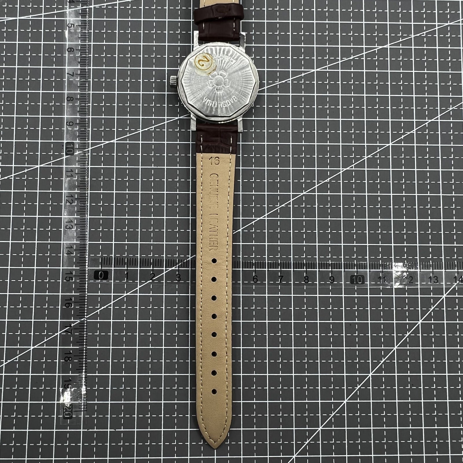 33mm Shanghai manual mechanical watch with single calendar, 17 jewels, shock-resistant design by Shanghai brand.