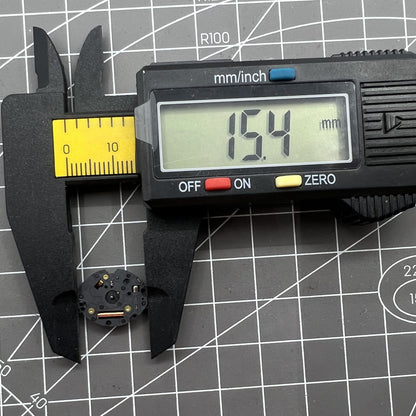 Epson TMI VX10A quartz watch movement with 2 hands, precise timekeeping for watch repair components.