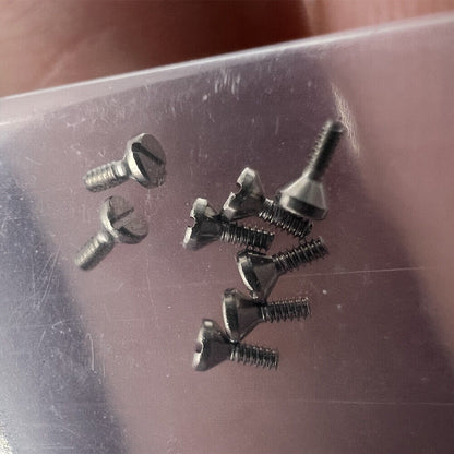 Precision movement watch screws for Miyota 8200, essential dial foot pin parts.