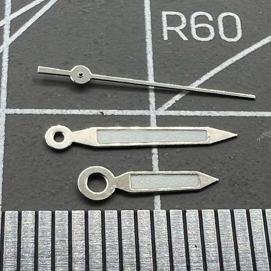Aiguilles de montre luminescentes vertes en forme de flèche avec garniture argentée de 12 mm pour mouvement Miyota 1M12
