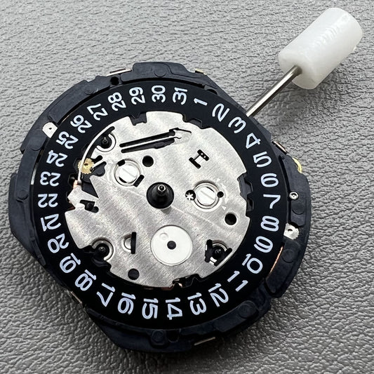 Japan Seiko 7T85A quartz watch movement showcasing precise timekeeping technology.