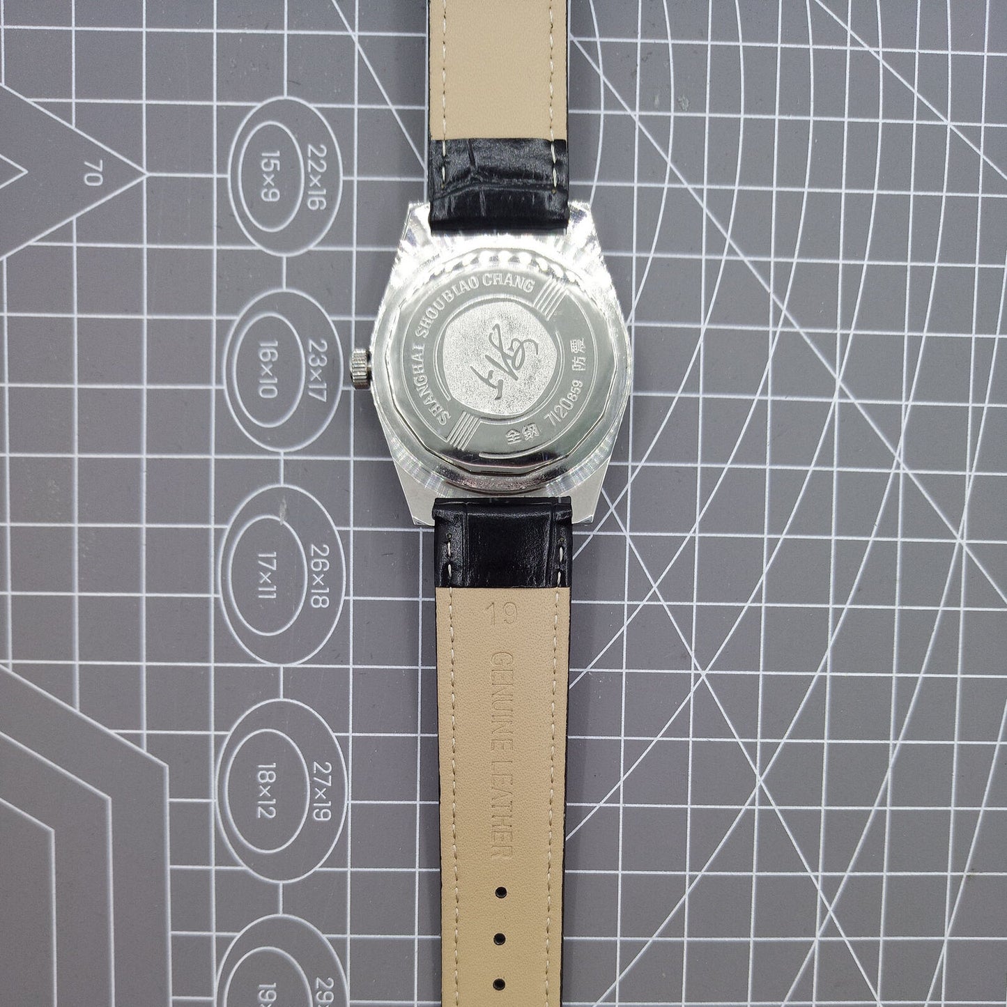 Shanghai Factory 38mm manual mechanical watch with white dial, 3 hands, 19 jewels, classic design by Shanghai Factory.