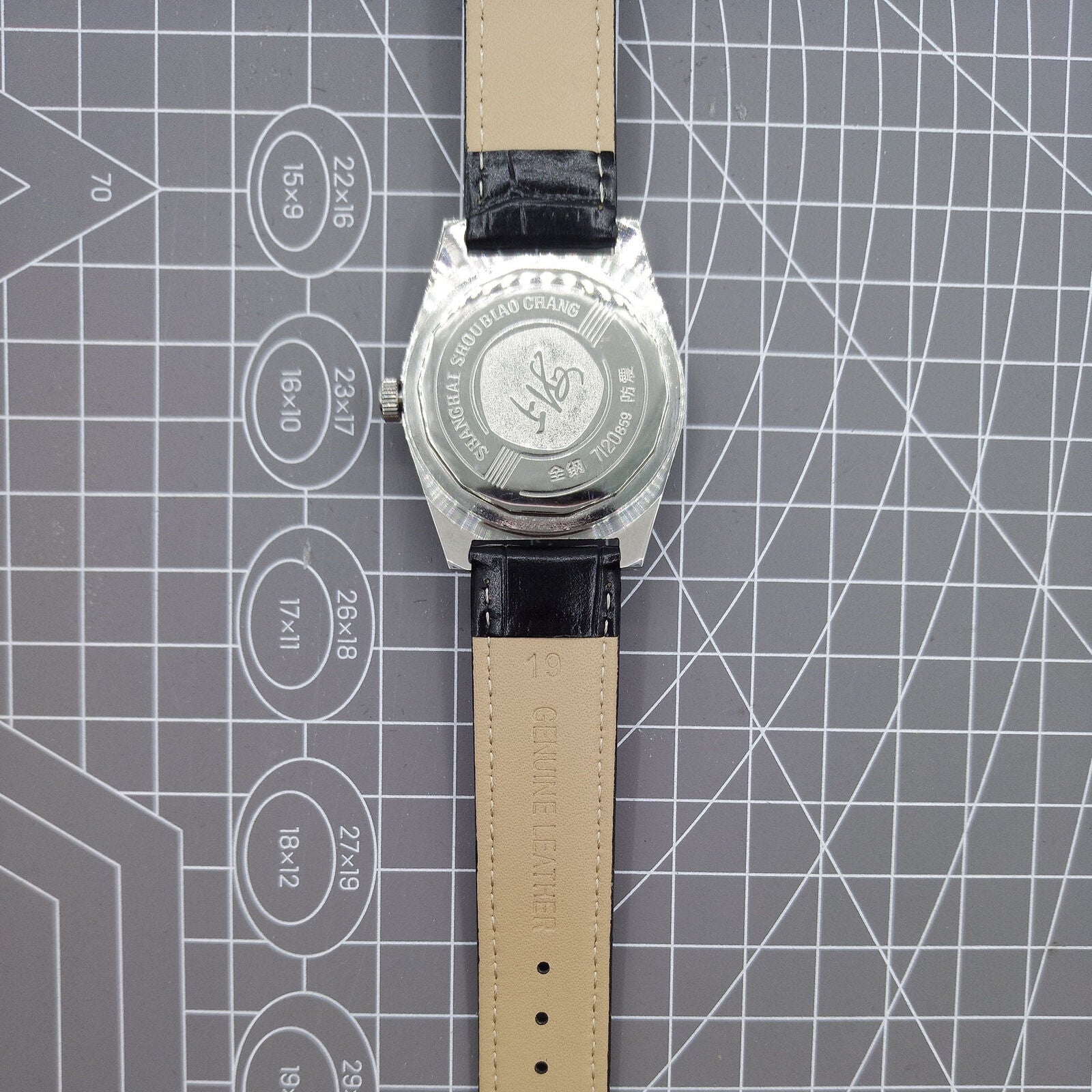 Shanghai Factory 38mm manual mechanical watch with white dial, 3 hands, 19 jewels, classic design by Shanghai Factory.