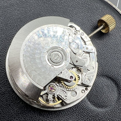 Dandong 7751 automatic watch movement displaying 8 hands for multifunctional time features and precision.