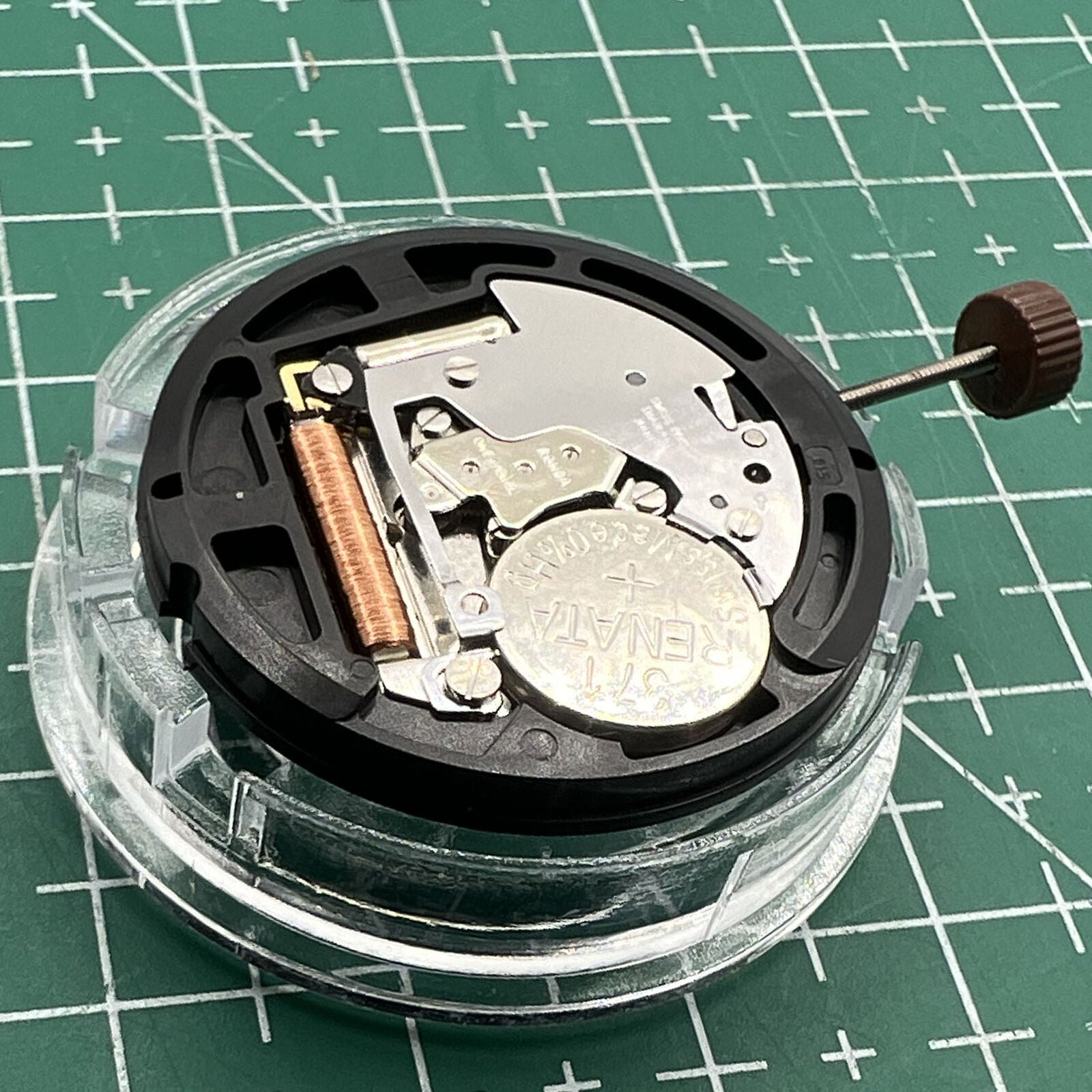 Swiss Ronda 509 quartz watch movement with black date disk at 3 o?clock, perfect for watch repairs and replacements.