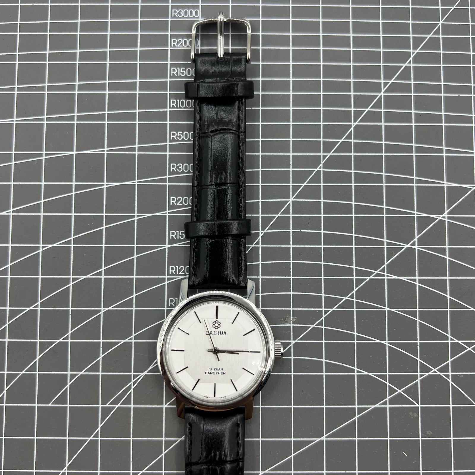 37mm China Baihua manual watch with silver dial, 19 jewels, shock-resistant design for durability