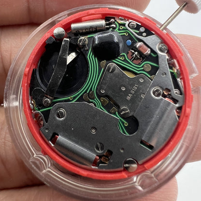 Close-up of ISA 8181 Swiss quartz watch movement featuring single calendar and multifunction for precise timekeeping.