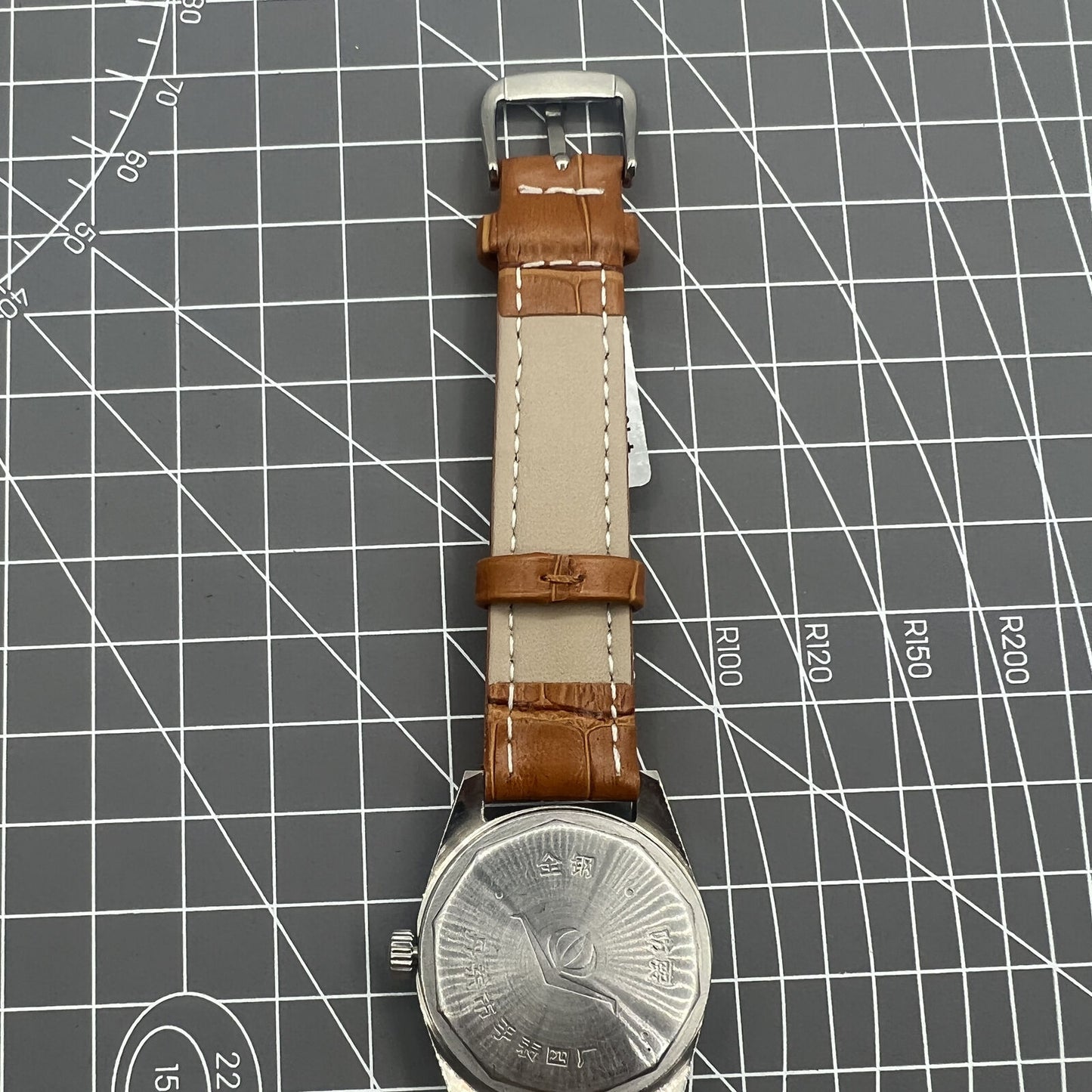 32mm Chunlan manual watch with silver dial, 17 jewel movement, and classic mechanical design.