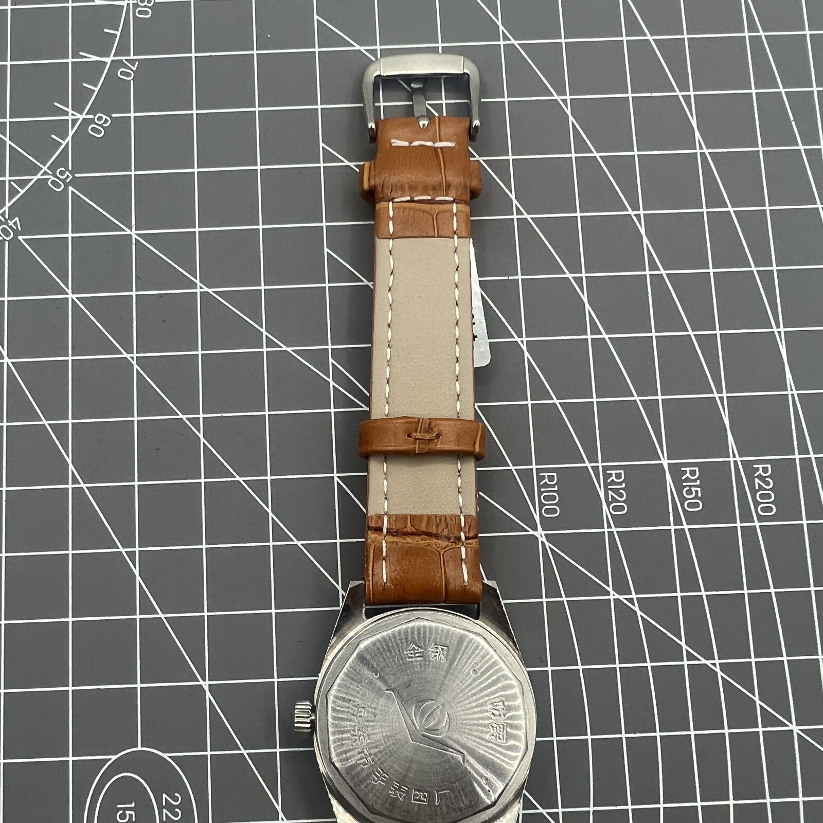 32mm Chunlan manual watch with silver dial, 17 jewel movement, and classic mechanical design.