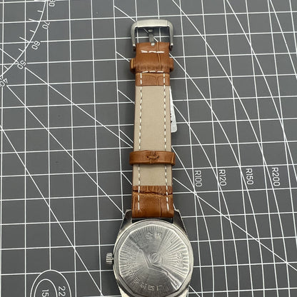 32mm Chunlan manual watch with silver dial, 17 jewel movement, and classic mechanical design.